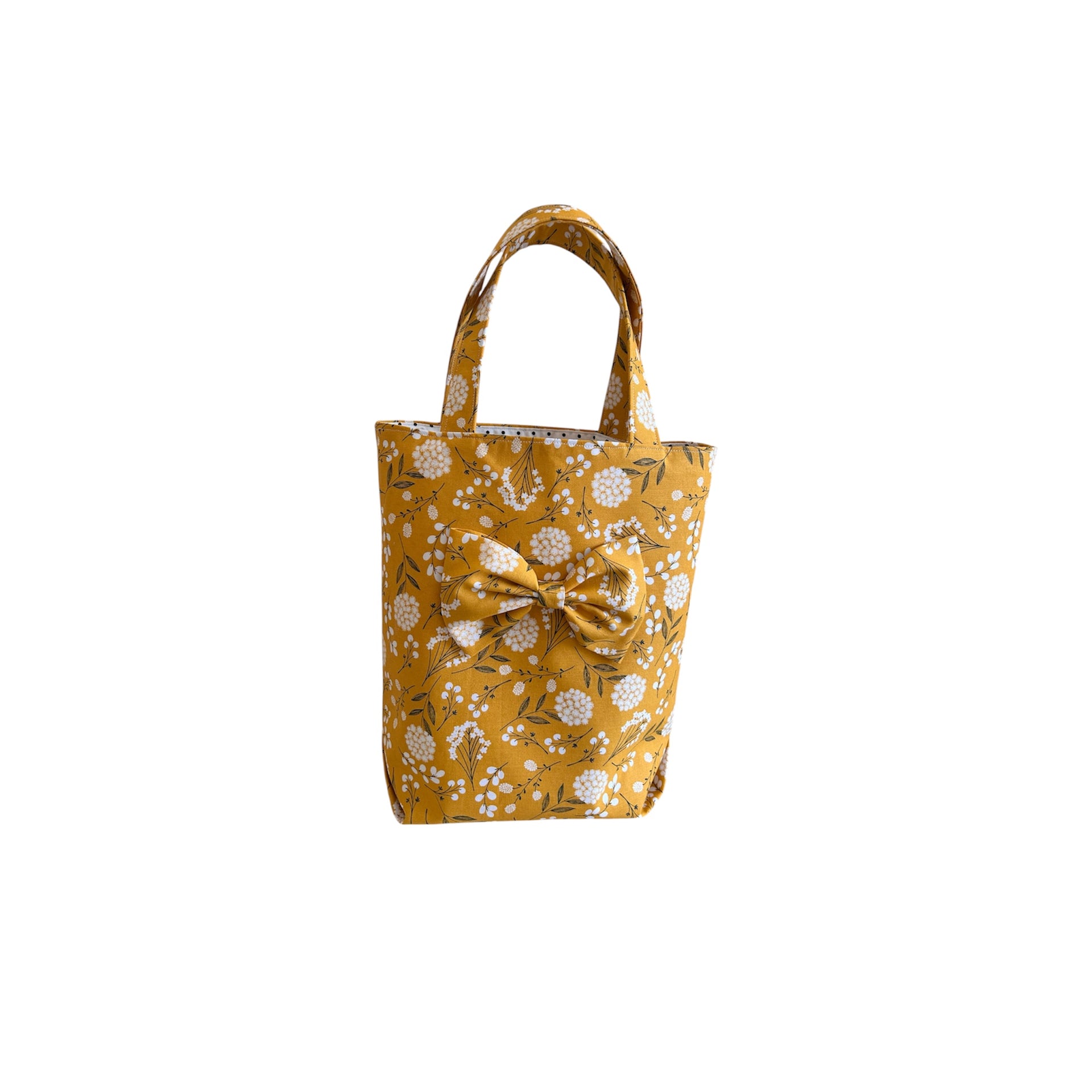 Bright Floral Bag With Attached A Bow