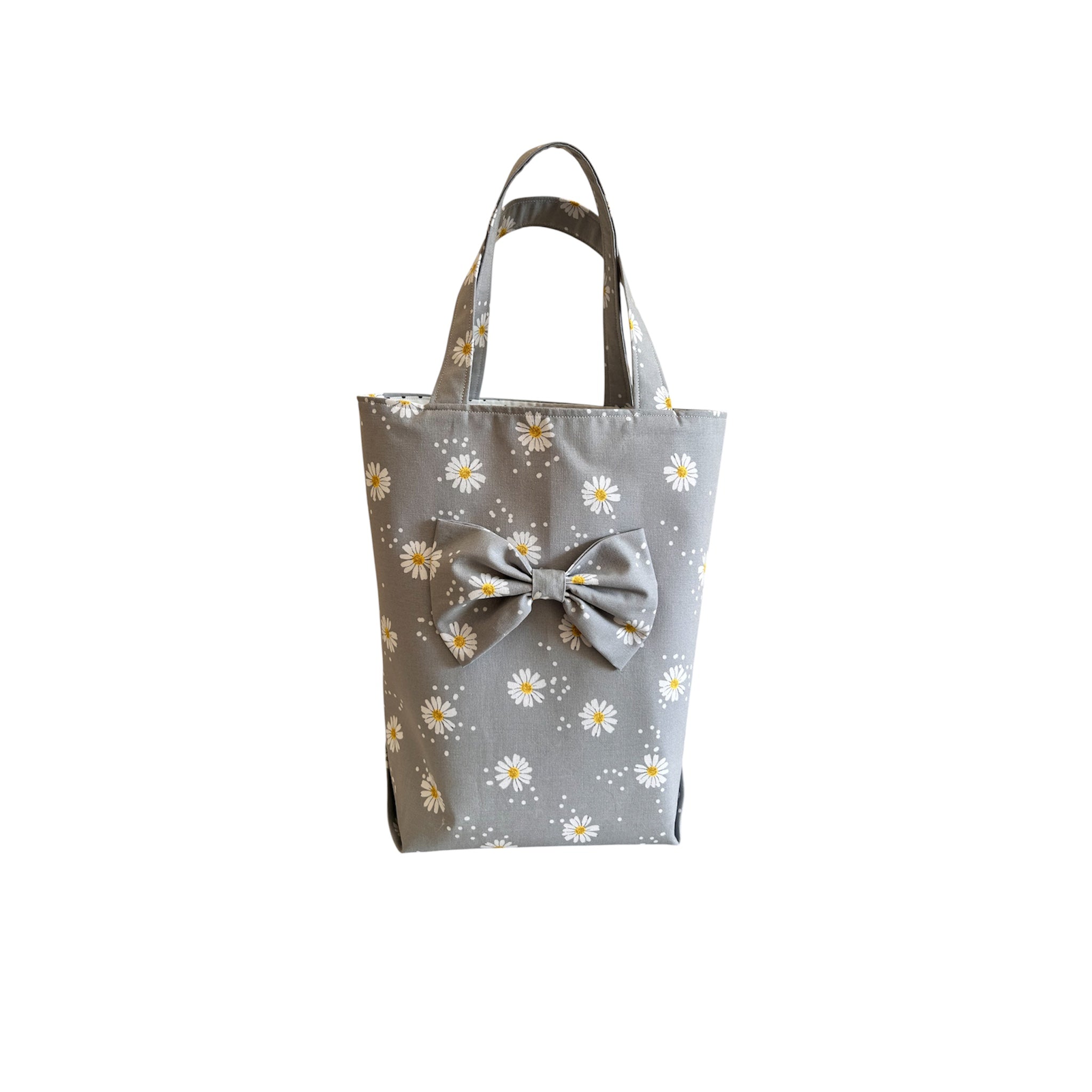 Bright Floral Bag With Attached A Bow